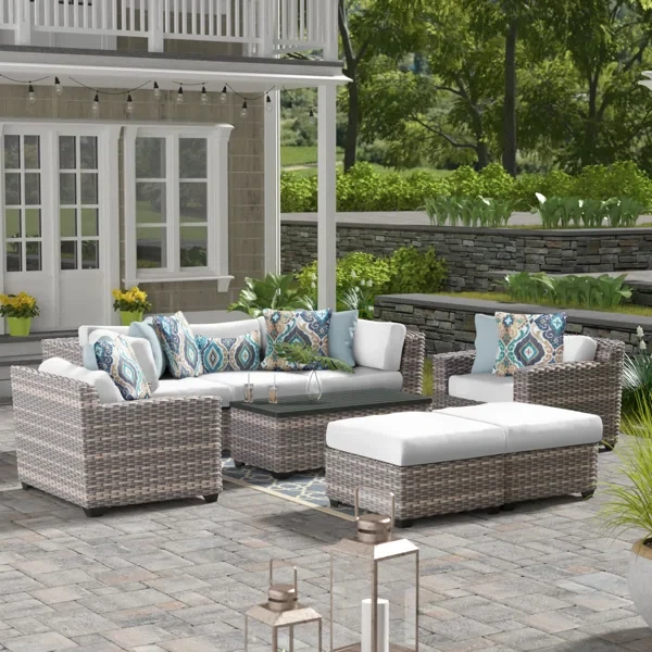 Amjad 8 Piece Outdoor Sectional Seating Group with Cushions